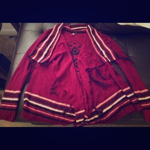 Maroon Aztec design cardigan.
